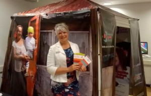 Jane Wright at the Business Against Poverty amazing marketing hut designed and donated by DigiPrint, Trowbridge