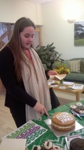 Catherine Brookes, Wiltshire Council cutting the official coffee morning cake!